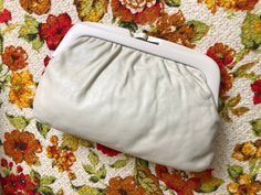 Classic Cream Rectangular Evening Bag, Classic Cream Evening Clutch, Elegant White Clutch For Spring, Elegant White Spring Clutch, Cream Pouch Clutch For Evening, Classic Beige Clutch For Daily Use, Formal Beige Clutch In Soft Leather, Spring Beige Clutch For Formal Occasions, Spring Formal Beige Clutch