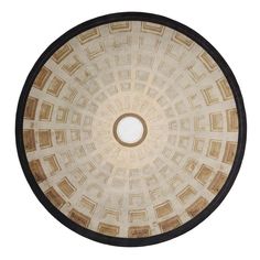 a circular ceiling in the center of a building with columns and square designs on it