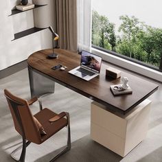 an office desk with a laptop on it in front of a window overlooking the trees