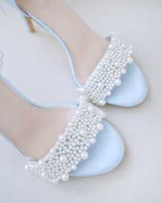 Classic satin high heel sandals adorned with allover pearls on the vamp and pearl ankle strap for romantic, elegant and feminine look. The delicate pearl beads are placed to create a graceful classic style. Simple and easy wear for bridal wear, bridesmaids, holiday party, wedding parties, and any special occasions. The light blue color can easily be your something blue.DETAILS:HEEL HEIGHT: 3.5 InchesCOLORS AVAILABLE: White, Ivory, Light Blue, Champagne, FuchsiaUPPER: Synthetic upper and liningMA Blue Champagne, Trendy Bride, Mid Calf Dresses, Drawstring Dresses, Women's Robe, Wedding Sandals, Wedding Parties, Evening Shoes, Boot Pumps