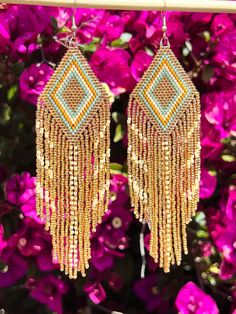 Handmade bohemian beaded fringe earrings Bohemian Brown Beaded Tassel Earrings, Bohemian Beaded Tassel Earrings, Elegant Beaded Fringe Jewelry For Festivals, Brown Bohemian Tassel Earrings, Bohemian Brown Tassel Earrings, Summer Fringe Chandelier Drop Earrings, Beach Dangle Chandelier Earrings With Tassels, Festival Tassel Earrings With Fringe, Elegant Tassel Chandelier Earrings For Festivals