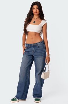 Travel back in time to the 2000s in nonstretch denim cargo jeans flaunting a low rise, full-length legs and plenty of pockets for utilitarian detail. 100% cotton Machine wash, dry flat Imported Cropped Dark Wash Flare Jeans With Pockets, Cropped Dark Wash Cotton Flare Jeans, Dark Wash Cropped Jeans With Pockets, Y2k Style Dark Wash Mid-rise Cargo Jeans, Y2k Mid-rise Dark Wash Cargo Jeans, Y2k Style Mid-rise Dark Wash Cargo Jeans, Cropped Denim Flare Jeans With Pockets, Mid-rise Cotton Utility Flare Jeans, Mid-rise Cotton Flare Jeans In Utility Style