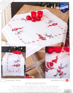 the christmas tablecloth is decorated with red balls