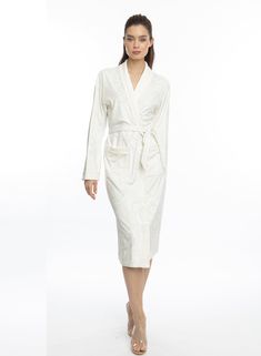 Wrap yourself in pure Bliss with our Angel White Long Robe. This luxurious robe is adorned with soft, angelic flower swirls and made of absorbent microfiber, making you feel like a true angel. Experience the ultimate comfort and indulgence with our Bliss robe. One size Long bath/lounge Robe Shawl collar 2 bottom side pockets Belt loops/removable waist tie closure Made of soft and absorbent microfiber Machine wash cool Tumble-dry low Elegant White Robe For Relaxation, Elegant Cream Sleepwear, Elegant White Sleepwear For Relaxation, Long Bath, Lounge Robes, Pocket Belt, Shawl Collar, Waist Tie, Feel Like