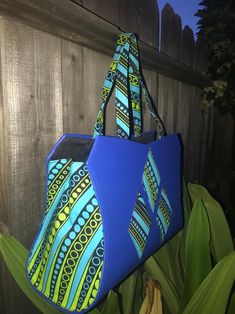 Oversized Bright Ankara Statement Hand Bags | Etsy Playful Blue Shoulder Bag For Travel, Reversible Blue Shoulder Bag For Beach, Reversible Blue Shoulder Bag For The Beach, Playful Blue Shoulder Bag For Daily Use, Blue Reversible Shoulder Bag With Double Handle, Reversible Blue Shoulder Bag With Double Handle, Blue Square Reversible Bag, Reversible Blue Shoulder Bag For Shopping, Vibrant Beach Bags