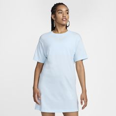 As comfy and easy to throw on as your favorite tee, this dress is ready for whatever you are. A curved hem and a flowy, oversized fit add a chic twist to a closet staple. Casual Solid Color T-shirt Dress For Loungewear, Oversized Casual T-shirt For Daywear, Oversized Crew Neck T-shirt Dress For Summer, Relaxed Fit Crew Neck T-shirt Dress For Spring, Casual Blue T-shirt Dress For Spring, Blue Casual T-shirt Dress For Spring, Blue Athleisure Summer Dress, Oversized Blue Casual Dress, Casual Oversized Blue Dress