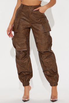 Available In Brown. Washed Faux Leather Jogger High Rise Button & Zip Closure Hand & Back Pockets Cargo & Utility Details Non Stretch Shell Coating: 100% Polyurethane Basic Fabric/Lining: 100% Polyester Imported | Weekend Warrior Washed Faux Leather Cargo Jogger Pant in Brown size XL by Fashion Nova Brown Fall Bottoms For Streetwear, Utility Faux Leather Bottoms With Pockets, Utility Style Faux Leather Bottoms With Pockets, Casual Faux Leather Cargo Pants With Pockets, Casual Faux Leather Pants With Side Pockets, Brown Cargo Pocket Bottoms For Fall, Utility Faux Leather Pants With Pockets, Utility Faux Leather Bottoms For Fall, Faux Leather Utility Bottoms For Fall