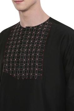 Black kurta with front geometric motif worked yoke. Comes with beige churidar.
Components:2
Thread
Neckline:Round
Sleeve Length:Full
Fabric:Silk,Cotton
Color:Black,Beige
Straight kurta with side slits
Kurta with side seam pockets
Closure:
Churidar: Waistband with tie up
Kurta: Front concealed placket - Aza Fashions Transitional Cotton Kurta With Geometric Embroidery, Traditional Straight Kurta With Geometric Embroidery, Traditional Kurta With Geometric Embroidery For Eid, Designer Kurta With Geometric Embroidery For Festive Occasions, Traditional Long Sleeve Sherwani With Geometric Embroidery, Traditional Bandhgala With Geometric Embroidery For Eid, Festive Eid Kurta With Geometric Embroidery, Festive Straight Kurta With Geometric Embroidery, Festive Cotton Traditional Wear With Geometric Embroidery