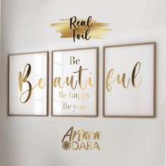 three gold and white wall art prints with the words be beautiful, be happy, be you