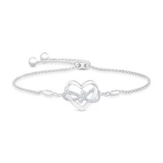 From the Hallmark Diamonds Collection, this bolo bracelet marries two iconic symbols and is inspired by the sentiment of Joy. Crafted in sterling silver, this bracelet features a central station of a heart intertwined with a diamond studded infinity symbol design that is decorated on each end with arrow details. This station is set on a wheat chain with a bolo clasp closure which allows the bracelet to be adjustable, ensuring the perfect fit. The diamonds are 1/10ctw, I in color, and I3 in clari Elegant White Promise Bracelet, White Sterling Silver Diamond Bracelet For Anniversary, Adjustable Promise Bracelets In Fine Jewelry Style, White Gold Heart Bracelet With Adjustable Chain, White Cubic Zirconia Heart Bracelet For Anniversary, Anniversary White Cubic Zirconia Heart Bracelet, White Gold Double Heart Bracelets For Anniversary, Elegant Silver Heart Bracelet For Promise, Adjustable Fine Jewelry Heart Bracelet For Anniversary