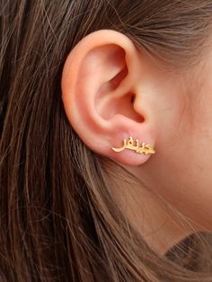 Color: gold Earrings size: 2.3cm/0.6 cm Material: 925 Sterling Silver Weight:1.15grams the price is for one pair of earrings You can make us write your name or the name of the person you love with the Arabic alphabet. The product is made of extremely high quality material. Unbreakable color is 925 silver. It has a solid structure and you can use it for many years. Solid silver Arabic Name earring Personalized Arabic Name earring-Arabic earring silver Islam earring Arabic Jewelry Stylish design e Gold Plated Cartilage Earrings As Gift, Silver Gold Plated Plug Earrings As Gift, Silver Gold-plated Plug Earrings For Gift, Blue Anklet, Arabic Jewelry, Arabic Names, Write Your Name, Name Earrings, Minimal Necklace