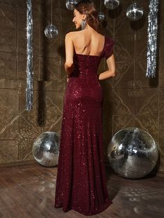 Product Code: FSWD0782 Embellishment: Sequin Fabric: 100% Polyester Back Style: Zipper Up Fully Lined: Yes Built-in Bra: No Available Color: Burgundy Stretch: Moderate Fits true to size Imported Model Information: Height: 5' 2" Bust: 33.5'' Waist: 24“ Hips: 35.5” wearing US size Small Burgundy Sequin Dress, Sequin Dresses, Sequin Fabric, Sequin Dress, Sequin, One Shoulder, Built In, Split, Zipper