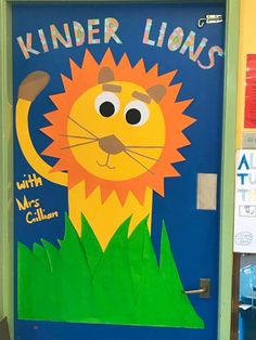 a door decorated with an image of a lion and the words kinder lions on it