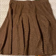 Nwt Women’s S Melissa Paige Skirt, Brown With Textured Animal Print, Elastic Waist Is 30”, Length Is 21”, Polyester Spandex Blend Brown Flowy Lined Mini Skirt, Flowy Brown Lined Mini Skirt, Spring Stretch Brown Skirt, Pleated Full Skirt, Brown Stretch Pleated Skirt, Stretch Brown Pleated Skirt, Brown A-line Lined Skirt, Spring Brown Lined Skort, Brown Stretch Skirt