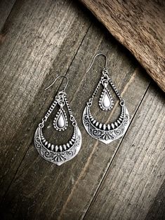 "These silver chandeliers have a rustic boho feel and are the perfect size. They have stainless steel ear wires and measure 2.75\" long and 1.5\" wide. ▲ To see more, click here to return to my shop: https://www.etsy.com/shop/AspenGlowStudio ▲ Don't forget to favorite my shop for updates Many of my designs have natural stones, these stones will slightly vary from one another so remember that yours may not be exactly like the ones pictured but they will be VERY similar. Please be careful with you Rustic Silver Jewelry For Festivals, Bohemian Metal Chandelier Earrings For Festivals, Bohemian Sterling Silver Chandelier Earrings, Bohemian Sterling Silver Chandelier Earrings For Festivals, Bohemian Metal Chandelier Earrings With Ear Wire, Bohemian Metal Chandelier Earrings Nickel Free, Bohemian Nickel-free Chandelier Earrings, Nickel-free Bohemian Chandelier Earrings, Bohemian Nickel-free Metal Chandelier Earrings