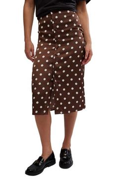 Playful polka dots cover this lightweight crepe midi skirt fronted by a button-up closure and perfect for adding fun, retro style to any look. 29" center front length (size 8) Hidden side-zip closure; front button closure Unlined 100% polyester Machine wash, tumble dry Imported Bohemian Lifestyle, Free People Skirt, Free People Clothing, Printed Midi Skirt, People Shopping, Stretch Satin, Latest Outfits, Polka Dot Print, Free Clothes