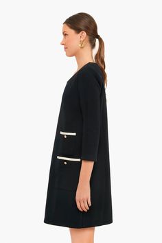 Inspired by the fine craftsmanship of a Parisian atelier, the Black Francoise Mod Mini Dress blends a 60s silhouette with minimalist details. Featuring a shift dress shape, long sleeves, and contrast pockets with buttons, this style is ultra-chic. Pair with gold jewelry for work and heels for date night!

Crewneck
Long sleeves
Mini length
Shift silhouette
Contrast piping on pockets
Gold button details on pocketsMaterial: 45% Cotton, 55% PolyesterCare: Machine wash cold, tumble dry low 60s Silhouette, Soft Ballet Flats, Minimalist Details, Twiggy Dress, Mod Mini Dress, Mini Hoop Earrings, Studded Sandals, Contrast Piping, Puff Sleeve Dresses