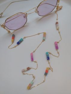 Laces for Sunglasses, Glasses Holder, Summer Accessories And Gift For Girls Eyeglass chains made with Miyuki beads are both stylish and useful. It is also preferred in sunglasses and prescription glasses for daily use. I designed it for you with gold and silver two chain options and very beautiful pastel colored beads. There will be no color fading, deterioration or darkening problems. Our eyeglass chain is suitable for women and girls to carry easily when working, traveling or taking part in ou Glasses Cord, Beaded Eyeglass Chain, Glasses Chains, Pastel Beads, Handmade Jewelry Tutorials, Eyeglass Chain, Eyeglass Holder, Miyuki Beads, Glasses Chain