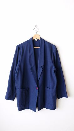 "Vintage Dark Blue/ Navy Blue Slouchy tailored Jacket/Minimal Blazer/Light Jacket. Measurements Length: 28 1/2\" Armpit to armpit: 21\" Shoulder: 16 1/2\"  Shoulder to end of sleeve: 22\" Condition: Gently used. There's no holes or stains. Good condition. ※Please read the policy before you purchase※" Suits For Women Navy Blue, Blue Career Blazer With Suit Collar, Blue Career Blazer With Notch Lapel, Career Blue Notch Lapel Blazer, Blue Cotton Blazer With Hidden Button Closure, Career Notch Lapel Blue Blazer, Blue Long Sleeve Blazer For Work, Blue Single Button Blazer For Fall, Blue Long Sleeve Career Outerwear