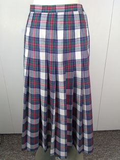 This Beautiful Pendleton Skirt is perfect for any classy occasion. Hidden Side Zipper with top button- No stretch  Wonderful Fabric 68%Poly/19%Silk/13%Rayon - Dry Clean VGVC with no flaws noted Size 14 - Refer to Measurements: Waist/30" Hip/40" Length/32" Smoke & Pet Free Studio Classic Fitted A-line Bottoms, Classic Fitted A-line Skirt, Casual Fitted Full-length Pleated Skirt, Classic A-line Skirt For Daywear, Classic Pleated Skirt For Daywear, Fitted Pleated Skirt With Button Closure, Classic Full-length Lined Skirt, Fitted Full-length Pleated Skirt For Workwear, Classic Full Length Lined Skirt