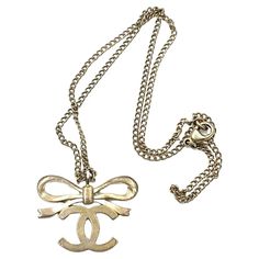 Chanel Classic Light Gold Ribbon Bow CC Necklace For Sale at 1stDibs Chanel Bow, Cc Necklace, Chanel Necklace, Devil Wears Prada, Jewelry Sale, Bow Necklace, Bow Jewelry, Gold Ribbon, Gold Light