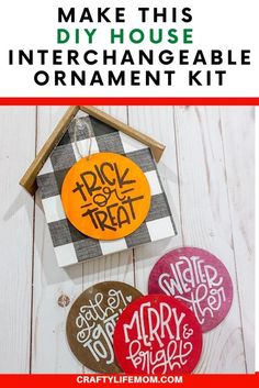 three different colored buttons with the words make this diy house interchangeable ornament kit