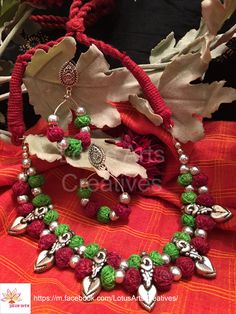 Green and maroon Cotton thread necklace and earrings set with oxidised silver links. Pairs well with Indian ethnic wear. Call or whatsapp +919840009398 to place your order. International and domestic orders accepted. https://m.facebook.com/LotusArtsCreatives/ Textile Earrings, Antique Silver Necklace, Oxidised Silver Jewelry, Diy Pendant Necklace, Thread Necklace, Junk Jewelry, Necklace Indian