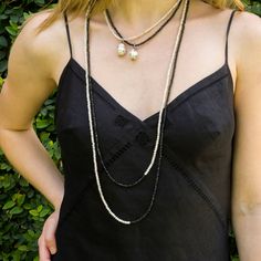 "What a great layering necklace! There are two necklaces so you can wear them separately, or together any way you want it. Half of each necklace is made from black spinel beads and half from silverite beads. Wear this necklace by itself or layer with: https://www.etsy.com/listing/562357625/black-spinel-necklace-black-spinel?ga_search_query=black%252Bspinel&ref=shop_items_search_32&frs=1 or: https://www.etsy.com/listing/690695269/natural-silverite-and-pearl-necklace?ref=shop_home_active_1 White Double Strand Necklaces For Layering, Elegant Double Strand Long Necklace With Natural Stones, Elegant Gemstone Beads Necklaces For Layering, Elegant Multi-strand Crystal Necklace With Gemstone Beads, Elegant Crystal Necklaces For Layering, Elegant White Beaded Necklaces For Layering, Single Strand Necklaces With Round Beads For Layering, Elegant Multi-strand Crystal Gemstone Necklaces, Elegant Multi-strand Crystal Necklaces With Polished Beads