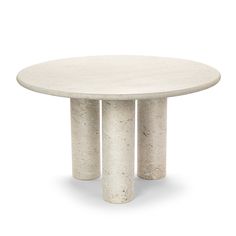 a white table with three columns on it's sides and one column at the end