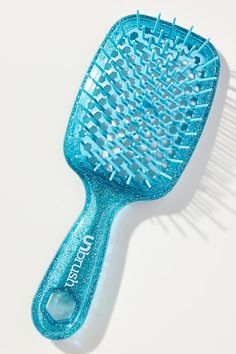 Highlights: DuoFlex Anti-Static Bristles™ work to gently detangle and reduce breakage Designed for wet and dry hair Backless vented cushion works to reduce styling time 105 dual length bristles Dimensions: 3.25" L, 1.75" W, 8.5" D Key Ingredients: Plastic How To Use: For best detangling results, hold the UNbrush® horizontally, gently brush hair from the bottom of the strand, and work your way up to the root. Repeat as needed | UNBrush Detangling Hair Brush by FHI Heat in Blue, Women's, Plastic at Anthropologie Unbrush Brush, Detangling Hair, Detangling Hair Brush, Brush Hair, Hair Detangler, Dry Hair, Wet And Dry, Hair Brush, Hair Tools