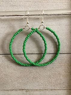 Hoop earrings are simple and lightweight. Seed beaded hoop earrings are 2 inches, handmade earrings will pair perfectly as a formal or casual accessory. Seed Bead Earrings * Perfect best friend gift!  * 2 inch earrings Earrings are READY TO SHIP TODAY!  MY ENTIRE COLLECTION https://www.etsy.com/shop/MiksJewelryShop   Thank you for supporting handmade and for visiting my corner of the internet. Please message me with any questions. Don't forget to FAVORITE ♥️ YOUR favorite items & also my shop so Everyday Green Circular Earrings, Handmade Green Beaded Hoop Earrings, Green Bohemian Hoop Beaded Earrings, Green Beaded Hoop Earrings For Gift, Small Hoop Earrings With Tiny Beads For Summer, Summer Dangle Hoop Earrings With Tiny Beads, Summer Small Hoop Jewelry With Dangling Beads, Green Bohemian Earrings For Everyday Wear, Bohemian Green Small Hoop Beaded Earrings