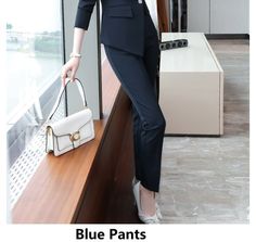 A lovely set of a blazer and pants, this apparel is a must-have in every working women's wardrobe to flaunt a smart stylish formal look. Made of polyester-spandex fabric, this OL-style pantsuit is comfortable and rich-looking. The design makes it a perfect choice for women 18-35 years old.

Specifications
Brand Name: GeraldBlack
Material: Polyester
Material: Spandex
Material Composition: Blazer+Microfiber
Clothing Length: Regular
Collar: Notched
Pant Closure Type: Button Fly
Age: Ages 18-35 Year Winter Uniform, Polyester Spandex Fabric, Uniform Design, Pant Suit, Countries Around The World, Working Woman, Formal Looks, Blue Pants, Women's Wardrobe