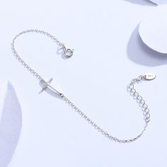 Women's Cross Bracelet in Sterling Silver FEATURES Cross Bracelet in real 925 Sterling Silver Comfortable to wear Lightweight and safe Includes gift box and cleaning cloth 🚚 Free Shipping Worldwide Estimated Delivery time: 8 to 13 business days 🎁 Ideal Gifts: Christmas gifts, family jewelry, friends gifts, couple gifts, anniversary gifts, birthday gifts, party gifts, graduation gifts, back to school gifts or special gifts! High Quality 925 silver Jewelry Material: S925 Sterling silver Size: 17 Silver Cross Bracelets For Gifts, Silver Cross Bracelets With Adjustable Chain, Silver Cross Bracelet With Adjustable Chain, Silver Cross Chain Bracelet As Gift, Silver Minimalist Rosary Bracelet As Gift, Classic Silver Rosary Bracelet As Gift, Christmas Gifts Family, Gifts Couple, Family Jewelry