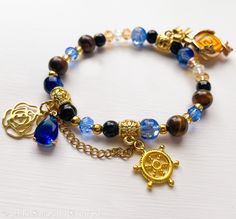 Genshin Auswirkungen Navia Charakter Themen Elastische Armband mit Metall Geo Vision Charme, Tigerauge, Schwarzer Achat Mit Gold Aufkleber, Kristallperlen, Glasperlen und blauer Tropfen, Edelstahl Bogen und Blume, und vergoldete Legierung Rad Perle. Kaufen Sie dies als Geschenk für Ihre spezielle Person? Oder vielleicht möchten Sie eine Box, um Ihren Einkauf sicher aufzubewahren? Achten Sie darauf, unsere kundenspezifische Verpackung mit Ihrer Bestellung zu überprüfen-perfekt für Geschenke und Lagerung ~! https://www.etsy.com/uk/listing/1836187341/upgraded-gift-wrap-and-packaging-for-any?ref=listings_manager_grid Alle Perlen und Anhänger werden sorgfältig ausgewählt, um das Farbschema, die Hobbys und Interessen jedes einzelnen Charakters widerzuspiegeln, und jedes Armband wird auf Bestellu Geo Vision, Hydro Vision, Navia Genshin, Jewelry Bracelets, Beaded Bracelets, Bracelet, Anime, Gold, Quick Saves