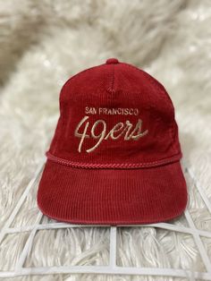 Vintage SF 49ers OG Script Logo Corduroy Hat wirh Cord by Youngan OSFM Snapback. Condition is "Pre-owned". Shipped with USPS First Class. In EXCELLENT Condition. Cut tag, snaps with the Youngan logo. Color Rate 9.5/10. No rips, no stain, no hidden flaws, just PURE VINTAGE. Corduroy Hat, Sf 49ers, Script Logo, San Francisco 49ers, Logo Color, First Class, Baseball Hats, Stain, Pure Products