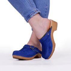 MADE FROM  LEATHER AND ALDER WOOD Clogs for Women BONDA Low heals ergonomic wooden sole and soft leather.  if you want other colour,  you can buy them in another listing in my shop https://www.etsy.com/listing/992773168/swedish-clogs-bonda-yellow-sandals made to order. Available in sizes 36-41. For other sizes please contact me EUR 35 l UK 2.5 l AUS 4.5 l USA 5 l up to 22.3cm l 8.78 inches  EUR 36 l UK 3.5 l AUS 5.5 l USA 6 l up to 23cm l 9.02 inches EUR 37 l UK 4 l AUS 6 l USA 6.5 l up to 23.7cm l 9.33 inches  EUR 38 l UK 5 l AUS 7 l USA 7.5 l up to 24.5cm l 9.65 inches EUR 39 l UK 6 l AUS 8 l USA 8.5 l up to 25.3cm l 9.96 inches EUR 40 l UK 7 l AUS 9 l USA 9 l up to 25.9cm l 10.2 inches EUR 41 l UK 7.5 l AUS 9.5 l USA 9.5 l up to 26.6cm l 10.47 inches EUR 42 l UK 8 l AUS 10 l USA 10.5 l Blue Leather Casual Clogs, Casual Blue Leather Clogs, Blue Leather Clogs With Leather Footbed, Suede Clogs With Buckle Closure And Round Toe, Suede Closed Toe Clogs With Cushioned Footbed, Casual Blue Mules With Leather Footbed, Blue Clogs With Leather Footbed And Round Toe, Closed Toe Suede Clogs With Buckle Closure, Suede Closed Toe Clogs With Buckle Closure