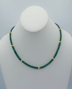 - Graduated Emerald Necklace with gold beads - Faceted Emerald beads; approx. 3-5mm - Gold-filled bead stations, 3-5mm - 14-karat yellow gold-filled hardware - Lobster clasp - Approx. 16-18"L - Made in the USA Gold Emerald Necklace With Rondelle Gemstone Beads, Gold Rondelle Beaded Necklace Single Strand, Elegant Gold Emerald Necklace With Faceted Beads, Gold Emerald Necklace With Polished Beads As Gift, Gold Emerald Necklace With Round Beads Single Strand, Gold Emerald Necklace With Round Beads, Emerald Beads Necklace, Black Beaded Jewelry, Emerald Bead