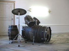 two drums are sitting next to each other on the floor