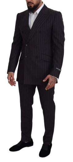 DOLCE & GABBANA Gorgeous brand new with tags 100% Authentic Dolce & Gabbana 2 piece suit. Striped blazer with peak lapels and two-button closure. The trousers feature a concealed zip and button closure, front slanted pockets, one watch pocket and two back welt pockets with buttons. Pressed pleats and unfinished hems. Color: Black striped Style: Double breasted 2 piece suit; includes blazer and pants Closure: Two button closure Fitting: Slim Fit Two inside pockets One open vent in the back 3-way Watch Pocket, Pieces Men, Formal Loafers, 2 Piece Suit, Suits For Sale, Slim Fit Suit, Dolce E Gabbana, Striped Blazer, Wool Suit