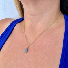 Blue Chalcedony Necklace, Cobalt Teardrop Pendant, Minimalist Blue Gold Drop Necklace, Dainty Layering Jewelry, Delicate necklace for women This simple dainty necklace features an soft cobalt blue chalcedony teardrop set in texturized bezel in gold filled. This framed stone pendant is suspended from a delicate 14k gold filled chain. This necklace is simply perfect for everyday wear and is perfect for layering with other pieces in your collection. About this Necklace: - Gemstone: Cobalt Chalcedon Blue Teardrop Pendant Necklace With Adjustable Chain, Blue Teardrop Necklace With Adjustable Chain, Dainty Blue Teardrop Pendant Necklace, Blue Teardrop Necklace With Delicate Chain, Blue Teardrop Crystal Necklace For Gifts, Blue Teardrop Minimalist Necklace, Tiny Heart Necklace, Gold Drop Necklace, Layering Jewelry