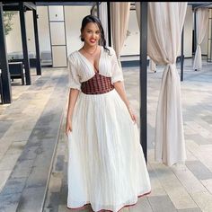 Beautiful Habesha Dress Modern Ethiopian Dress Women's Dress Habesha Kemis Eritrean Dress Women's Style ሀበሻ ቀሚስ ሀበሻ ልብስ Traditional Fitted V-neck Dress, Fitted Short Sleeve Dresses For Traditional Ceremonies, Traditional Dresses With Short Sleeves For Ceremonies, Traditional Short Sleeve Dresses For Ceremonies, Folk Style Fitted Dress With Traditional Patterns, Bohemian Short Sleeve Dress For Traditional Ceremonies, Fitted Maxi Dress With Traditional Patterns For Ceremonies, Traditional V-neck Maxi Dress For Festivals, Fitted V-neck Peasant Dress