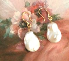 Stunning Vintage Gold Filled Pearl Earrings Classic Wedding Style Bridal Dress Jewelry Total drop of 3.5 cm   Pearls each approx 1.6 cm long x 1.2 cm wide Total weight of both together is 3.18 grams This is a lovely pair, in excellent condition (box for display purposes only) Customs and import taxes Buyers are responsible for any customs duties and import taxes charged by their respective Governments Sellers are not responsible for these charges, nor for any delays due to customs actions. Pear-shaped White Bridal Earrings For Wedding, Victorian Pearl Earrings For Wedding, White Pear-shaped Bridal Earrings, Victorian White Pearl Earrings For Formal Occasions, Victorian Drop Bridal Earrings For Wedding, Victorian Gold Bridal Earrings For Wedding, Baroque Pearl Earrings For Wedding, Baroque Earrings For Wedding, Baroque White Pearl Earrings For Wedding