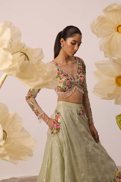 A burst of freshness - that's what this lupin pistachio green lehenga set is all about! Paired with multicolor resham embroidered full sleeves blouse in a monochrome shade, it is the ultimate bridesmaids's dream. The skirt, crafted in organza, features intricate embroidery on circumference part of the lehenga, and is perfect for twirl-ready moments. Also featuring a organza dupatta with the same to go all out with it Wedding Chaniya Choli, Full Sleeves Blouse, Embroidery Pearls, Cape Lehenga, Kurta Lehenga, Function Dresses, Lehenga Pattern, Lehenga Dupatta, Net Embroidery