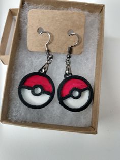 Plastic Earrings For Gifts, Round Plastic Earrings For Gifts, Black Plastic Jewelry Gift, Themed Red Earrings, Fandom Style Black Jewelry Gift, Black Fandom Inspired Jewelry Gift, Black Fandom Jewelry Gift, Pokemon Earrings, Anime Earrings