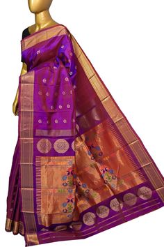 Enhance your saree collection with the latest addition of a Purple and Red Color dual tone Maharani Paithani saree. This exquisite piece features intricate Allover Buti Work, showcasing a beautiful combination of golden zari and traditional motifs such as the chand (moon) and Mor (peacock). Made with traditional handloom techniques, this saree is a timeless investment. Color: A shade of purple and red dual-tone color Technique: Amazing work of golden butta work on the body with traditional paithani design weaving on the pallu Fabric: Paithani Silk Quality: Indyvogue's Assurance of Pure Silk Mark Certified Saree Maharani Paithani, Paithani Saree, Traditional Motifs, Work Online, Color Techniques, Work Sarees, Super Sale, Saree Collection, Shades Of Purple