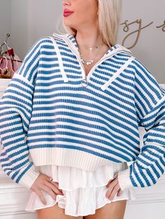 Wrap yourself in coastal comfort with the Cozy By The Coast Pullover from Sassy Shortcake. Cream and blue stripes add a touch of nautical charm, while the half-zip and sweater knit provide warmth and style. Perfect for a beach bonfire or a walk along the shore. content: 100% acrylic fit: true to size, model wearing a size small. Sassy Shortcake, Nautical Outfits, High School Outfits, Beach Bonfire, Womens Sweaters, Summer Fashion Outfits, Cute Sweaters, The Coast, Sweater Weather