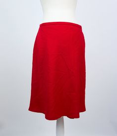 "- Classic red A-line mini skirt - Excellent condition (please see pictures) - 100% virgin wool, acetate lining - Tag size S (please see measurements) Measurements (flat): Waist: 35 cm / 13.8 inches Length: 55 cm / 21.7 inches Bottom width: 60 cm / 23.6 inches RESERVATIONS are available, please contact me for details. SHIPPING INFO: Shipping price in the listing is for the \"Standard Latvian post shipping\". Includes tracking info and takes: * 5 business days within European Union * 10-15 busine Classic Red Workwear Skirt, Classic Red Skirt For Work, Red Winter Skirt With Relaxed Fit, Red Pleated Knee-length Mini Skirt, Red Knee-length Lined Mini Skirt, Red Fitted Full Mini Skirt, Red A-line Skirt For Workwear, Red Relaxed Skort With Lined Skirt, Classic Red Winter Skirt