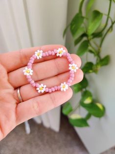 "*Flower spacing and flower count on bracelet may vary depending on bracelet size! SIZING: 3.5\" PREEMIE/SMALL NEWBORN 4\"NEWBORN-5MONTH 4.5\" 6-12 MONTH 5\" 1 YEAR+ SIZING IS JUST A GUIDE. IT IS BEST TO MEASURE FOR BEST ACCURACY. Take a sting and loop it around your babies wrist, leave a bit of wiggle room and measure to a tape measure or ruler. *Handmade item *Can be personalized Stretch and elastic fit. Customizable worded bracelet stacks. Perfect for birthdays, Christmas gifts, stocking stuf Sunflower Bracelet, Newborn Flower, Bracelet Stacks, Girl Bracelet, Daisy Jewelry, Sunflower Jewelry, Daisy Bracelet, Group Gifts