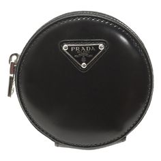 Elevate The Style Of Your Bag With This Signature Mini Pouch Keychain From Prada. This Mini Pouch Keychain Is Crafted Of Shiny Black Leather And Features The Signature Prada Triangle Logo With Silver-Toned Hardware. Perfect For Storing Small Essentials Such As Earbuds, This Chic And Fashion-Forward Keychain Adds A Touch Of Luxury To Your Ensemble. Model: 1tl431 Black Smooth Leather Silver-Tone Hardware Prada Triangle Logo Plaque Keychain Attachment Zipper Closure Interior Prada Logo Black Interi Luxury Coin Purse With Coin Pocket, Luxury Compact Travel Coin Purse, Luxury Black Coin Purse With Interior Key Chain Holder, Designer Compact Leather Coin Purse, Designer Compact Coin Purse For Travel, Designer Coin Purse With Removable Pouch For Formal Events, Luxury Leather Coin Purse For Formal Use, Luxury Leather Compact Coin Purse, Luxury Compact Leather Coin Purse