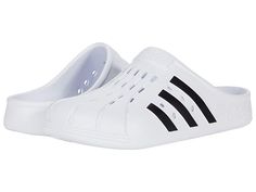 adidas Adilette Clog - Shoes : Footwear White/Core Black/Footwear White : Slip-on adidas Adilette Clog for everyday comfort. Based on the iconic adidas slide, these clogs are as functional as they are comfortable. Whether you're walking to the gym or pool for an early-morning workout or just want to keep the slouchy-casual vibe going all through your day, slip your feet into the contoured EVA footbeds and head for the door. Synthetic upper, lining, and insole. Slip-on construction. Regular fit. Black Footwear, Adidas Slides, Clog Shoes, Adidas Adilette, Sport Shoes Men, White Core, Metallic Bag, Outdoor Men, Boy Shoes